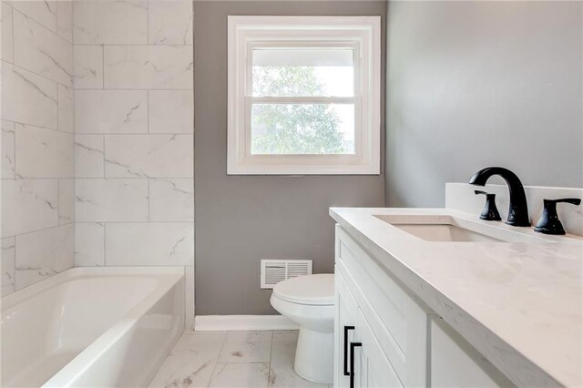 empty room featuring ornamental molding, a wealth of natural light, and light hardwood / wood-style floors