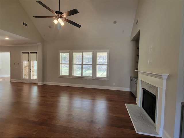 25 Mountain Crest Dr, Oxford, GA 30054 - unfurnished living room featuring a fireplace, a ceiling fan, visible vents, dark wood finished floors, and high vaulted ceiling