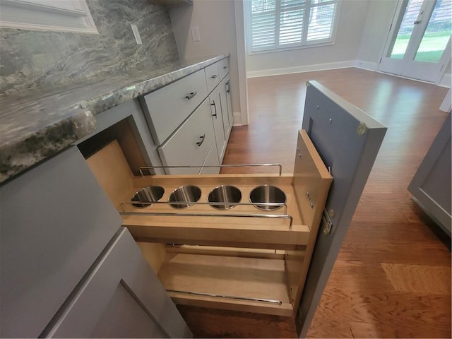 25 Mountain Crest Dr, Oxford, GA 30054 - interior details with white cabinets, wood finished floors, and baseboards