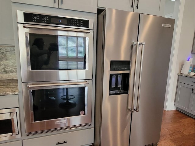 25 Mountain Crest Dr, Oxford, GA 30054 - kitchen with appliances with stainless steel finishes and light stone counters