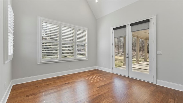 25 Mountain Crest Dr, Oxford, GA 30054 - empty room featuring french doors, wood-type flooring, baseboards, and vaulted ceiling