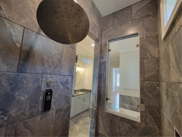 25 Mountain Crest Dr, Oxford, GA 30054 - full bath with ornamental molding, a tile shower, tile walls, vanity, and marble finish floor