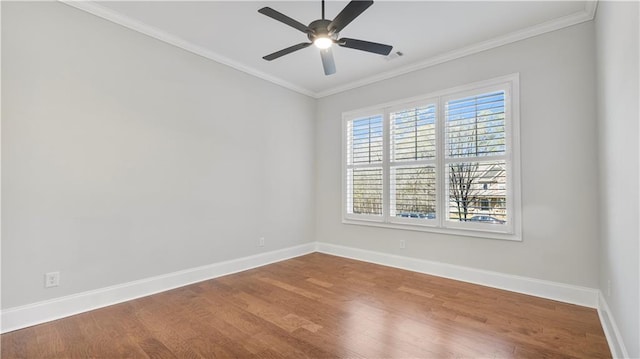 25 Mountain Crest Dr, Oxford, GA 30054 - unfurnished room featuring baseboards, crown molding, a ceiling fan, visible vents, and wood finished floors