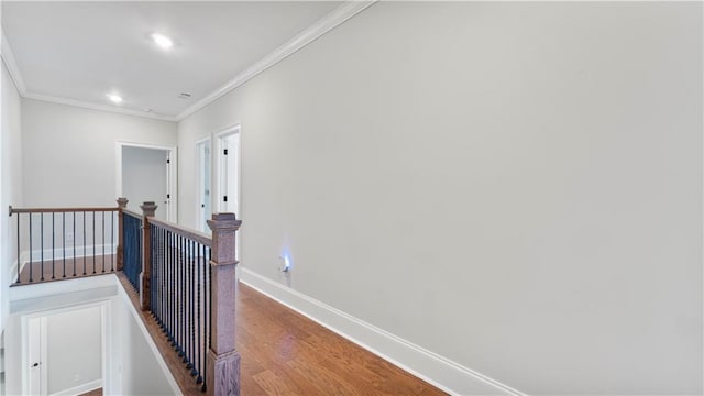 25 Mountain Crest Dr, Oxford, GA 30054 - hall with baseboards, recessed lighting, an upstairs landing, crown molding, and wood finished floors