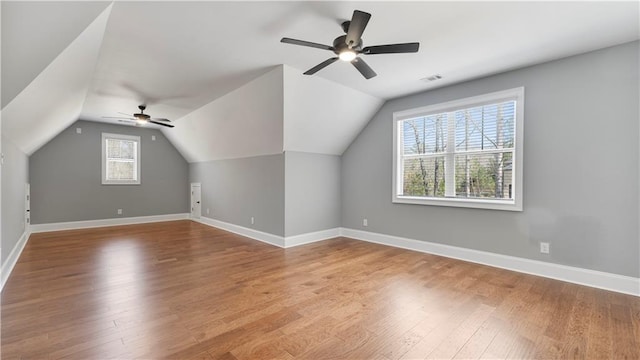 25 Mountain Crest Dr, Oxford, GA 30054 - additional living space featuring wood finished floors, lofted ceiling, a ceiling fan, and visible vents