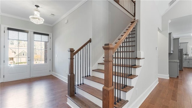 25 Mountain Crest Dr, Oxford, GA 30054 - entryway with a notable chandelier, french doors, stairs, and wood finished floors
