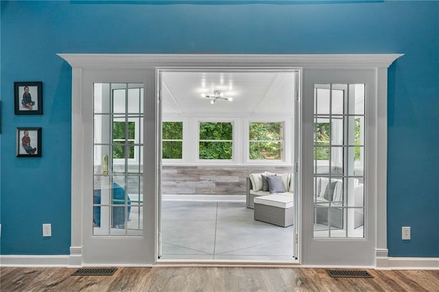 340 Chandler Ct, Sugar Hill, GA 30518 - entryway featuring baseboards and wood finished floors