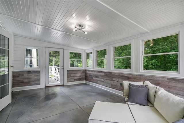 340 Chandler Ct, Sugar Hill, GA 30518 - unfurnished sunroom featuring healthy amount of natural light, baseboards, vaulted ceiling, and finished concrete floors
