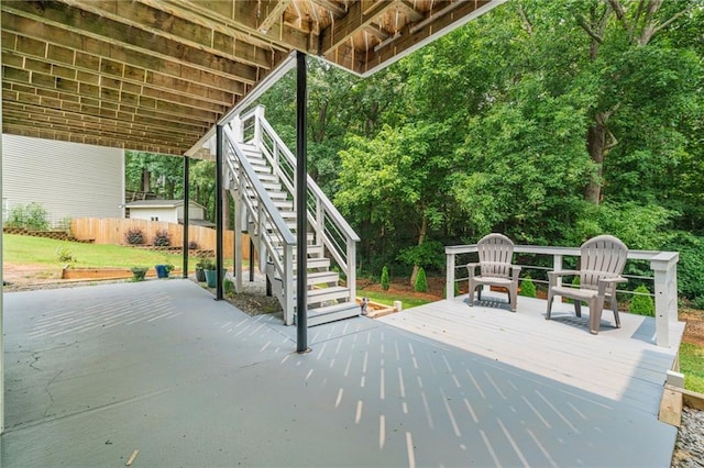 340 Chandler Ct, Sugar Hill, GA 30518 - wooden terrace with stairway and a patio area