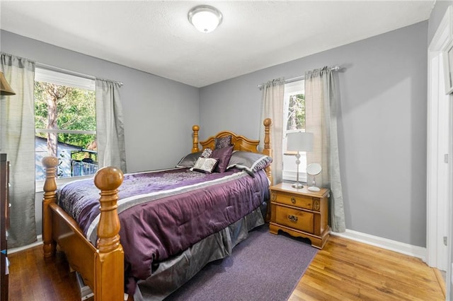 bedroom featuring hardwood / wood-style floors