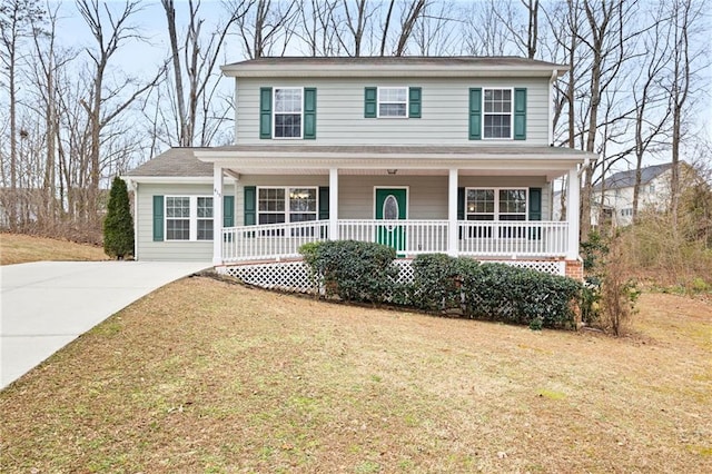 view of front of house featuring a porch and a front yard