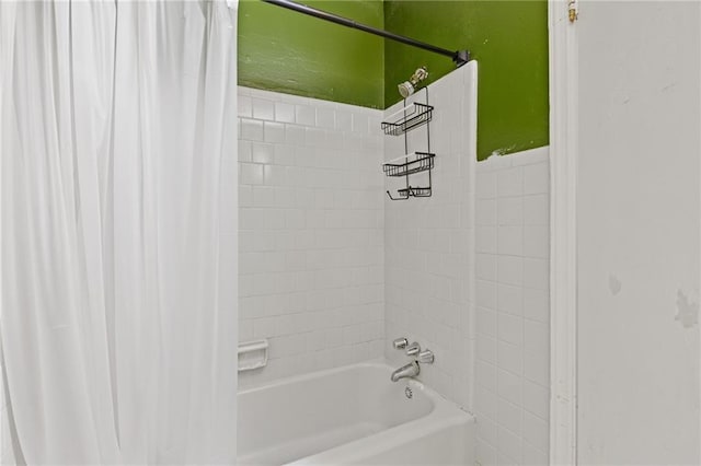 bathroom featuring shower / bathtub combination with curtain