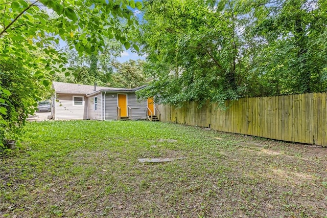 view of yard with fence