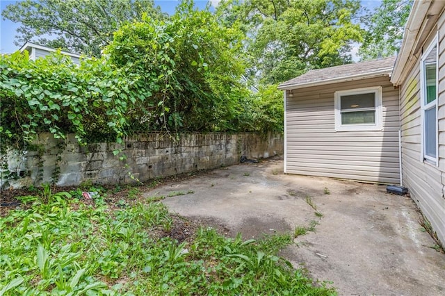 view of patio / terrace featuring fence