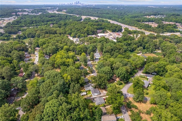 drone / aerial view with a view of trees