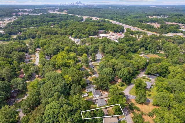 aerial view featuring a forest view