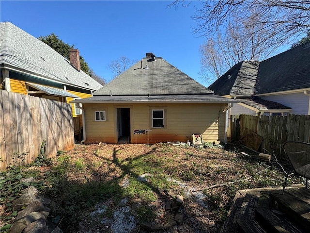 193 Berean Ave SE, Atlanta, GA 30316 - rear view of property featuring a shingled roof and fence