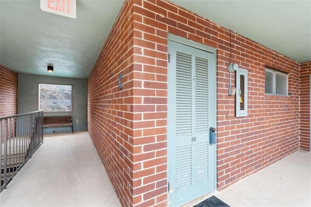 91 Rumson Rd Unit C 30, Atlanta, GA 30305 - property entrance featuring brick siding