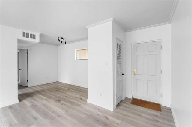 91 Rumson Rd Unit C 30, Atlanta, GA 30305 - empty room featuring wood finished floors, crown molding, and baseboards