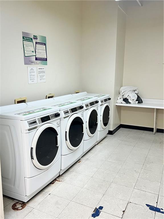 laundry area with washer and clothes dryer