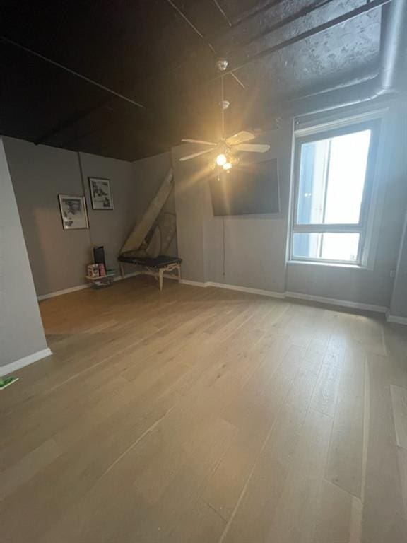 bonus room with hardwood / wood-style flooring