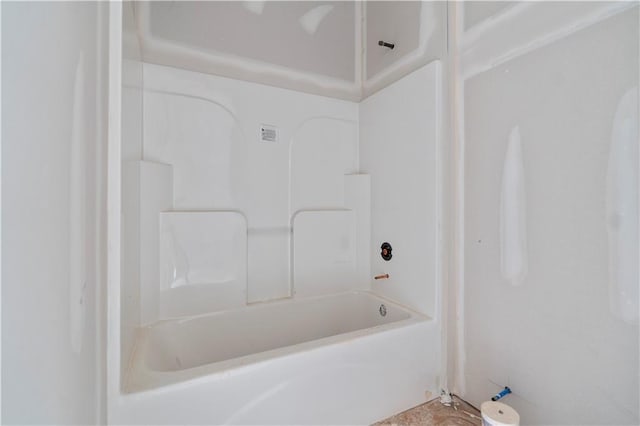 bathroom with shower / bath combination