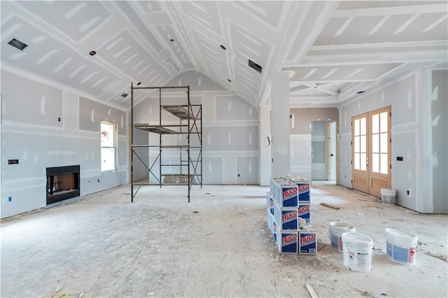 unfurnished living room with french doors