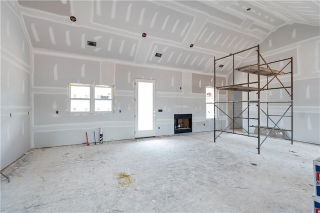 unfurnished living room featuring a fireplace