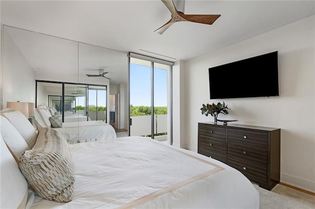 bedroom with access to exterior and ceiling fan