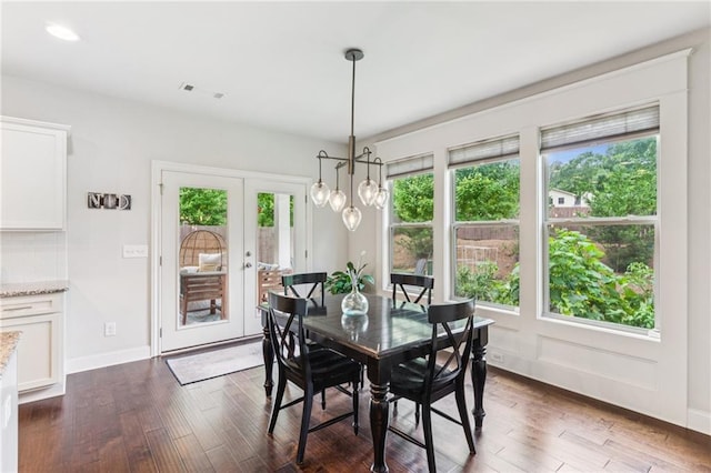 4972 Park Vale Dr, Sugar Hill, GA 30518 - dining space with dark wood-style flooring, a chandelier, french doors, and recessed lighting