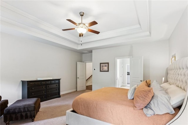 4972 Park Vale Dr, Sugar Hill, GA 30518 - carpeted bedroom with a tray ceiling, ornamental molding, and a ceiling fan