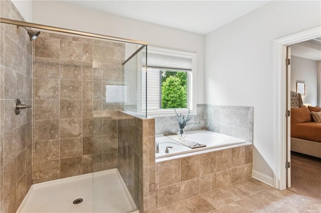 4972 Park Vale Dr, Sugar Hill, GA 30518 - full bathroom featuring connected bathroom, a bath, a tile shower, and tile patterned flooring