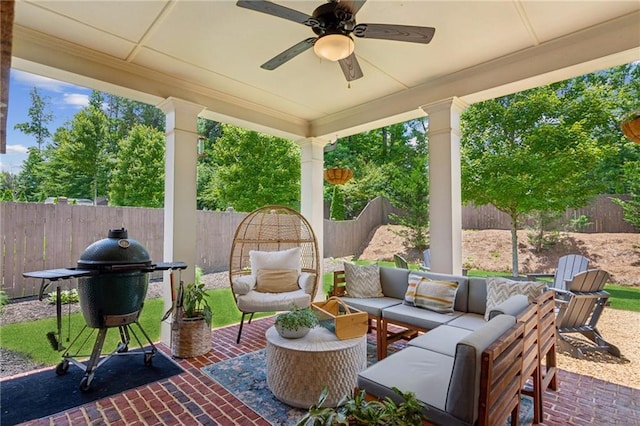 4972 Park Vale Dr, Sugar Hill, GA 30518 - fenced backyard featuring a ceiling fan, a grill, an outdoor living space, and a patio