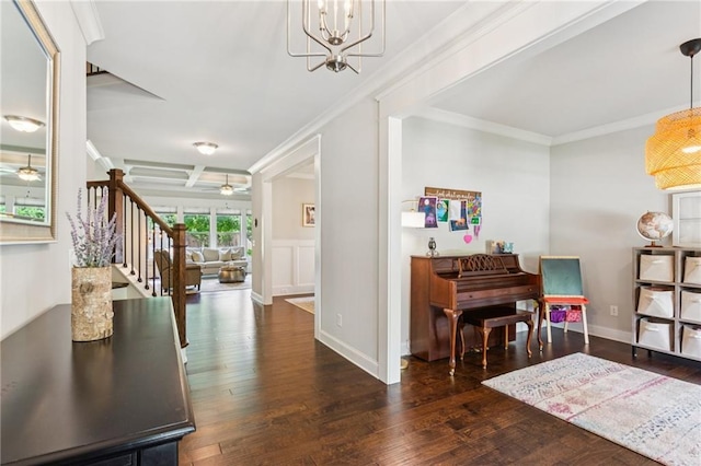 4972 Park Vale Dr, Sugar Hill, GA 30518 - foyer entrance with stairway, a chandelier, crown molding, and dark wood-style floors