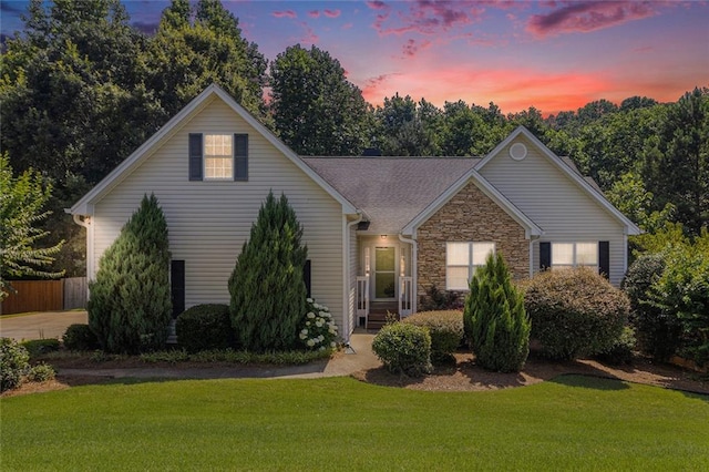 6411 Compass Dr, Flowery Branch, GA 30542 - view of front facade featuring stone siding