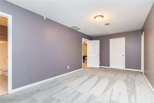 6411 Compass Dr, Flowery Branch, GA 30542 - unfurnished bedroom featuring carpet floors and ensuite bath