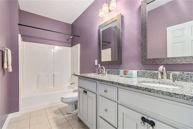 6411 Compass Dr, Flowery Branch, GA 30542 - bathroom featuring double vanity, shower / washtub combination, and tile patterned flooring