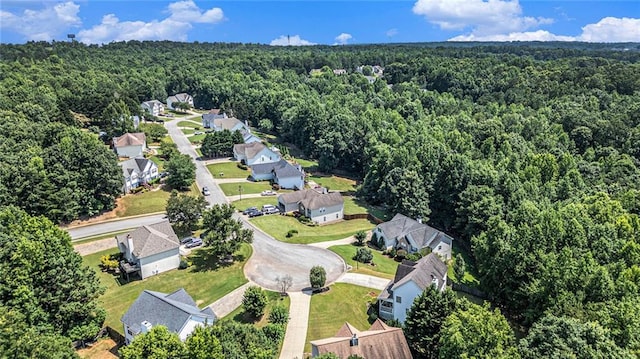 6411 Compass Dr, Flowery Branch, GA 30542 - aerial view of residential area with a heavily wooded area