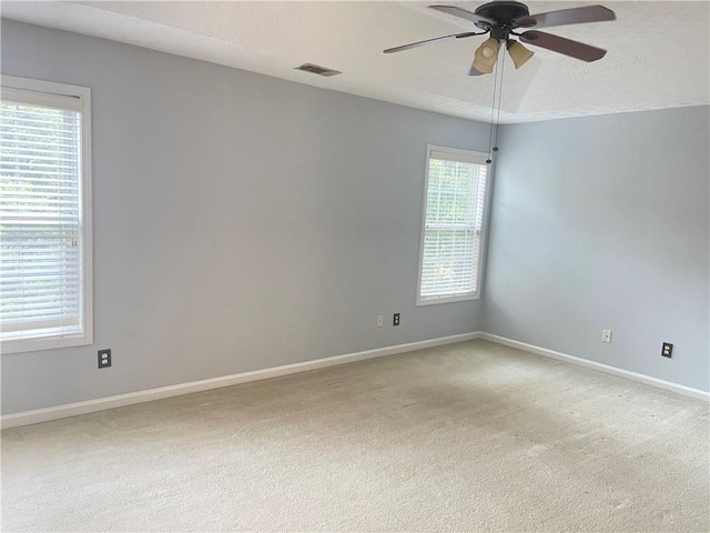 795 Abbotts Mill Ct Unit 73, Johns Creek, GA 30097 - empty room featuring ceiling fan, light colored carpet, and a textured ceiling