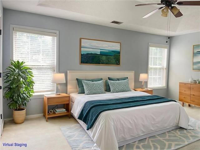 795 Abbotts Mill Ct Unit 73, Johns Creek, GA 30097 - bedroom with light colored carpet and ceiling fan