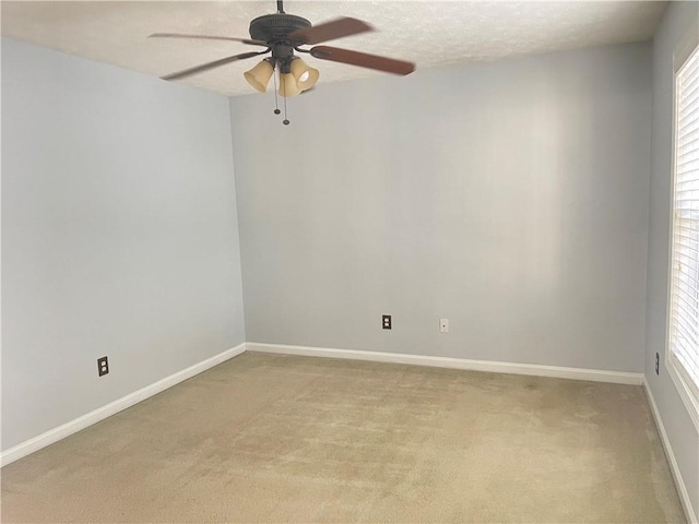 795 Abbotts Mill Ct Unit 73, Johns Creek, GA 30097 - empty room with ceiling fan, light carpet, healthy amount of natural light, and a textured ceiling