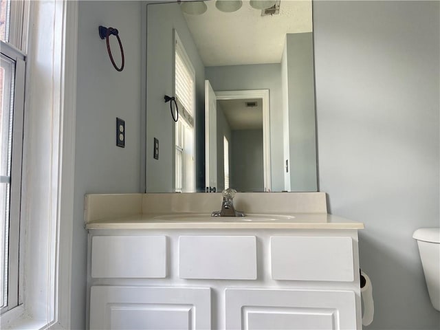 795 Abbotts Mill Ct Unit 73, Johns Creek, GA 30097 - bathroom featuring toilet and vanity