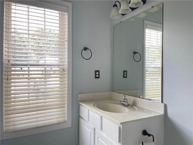 795 Abbotts Mill Ct Unit 73, Johns Creek, GA 30097 - bathroom with vanity and healthy amount of natural light