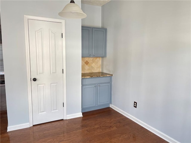 795 Abbotts Mill Ct Unit 73, Johns Creek, GA 30097 - unfurnished dining area featuring dark wood-type flooring and baseboards