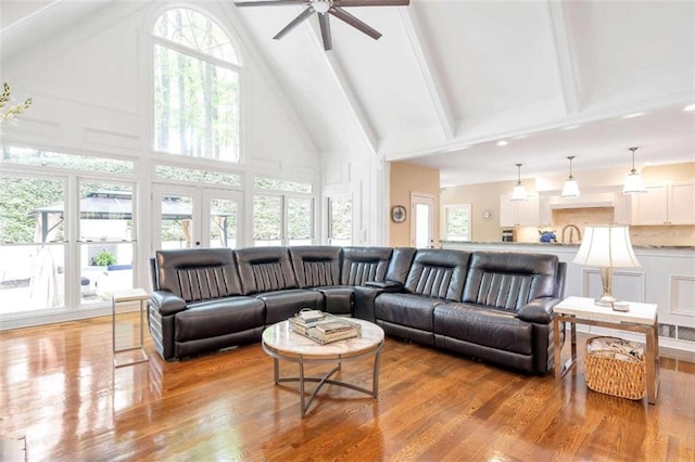 living room featuring a wealth of natural light and wood-type flooring