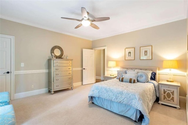 bedroom with light carpet, ornamental molding, and ceiling fan