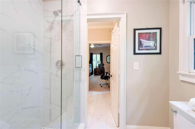 bathroom featuring vanity, ceiling fan, walk in shower, crown molding, and tile patterned flooring