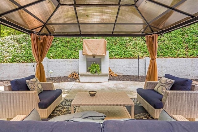 view of patio / terrace featuring a gazebo and an outdoor hangout area