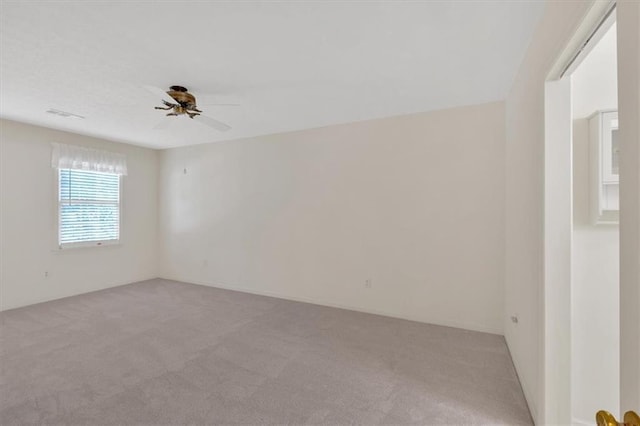4181 Singing Post Ln NE, Roswell, GA 30075 - empty room featuring light colored carpet and ceiling fan