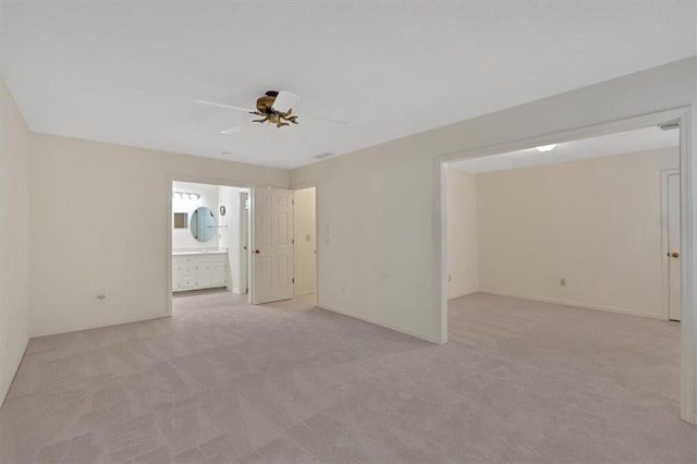 4181 Singing Post Ln NE, Roswell, GA 30075 - spare room featuring a ceiling fan and light colored carpet